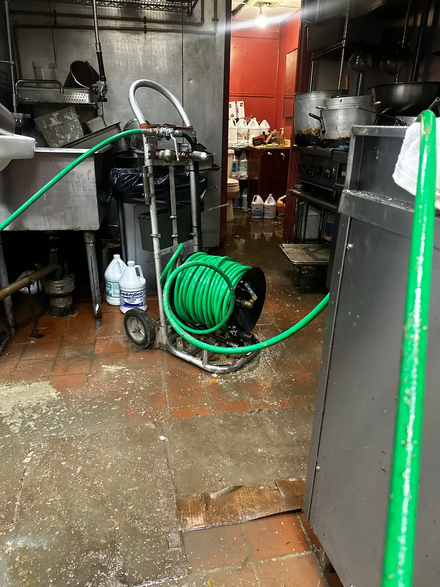 Jetting a grease line in a commercial kitchen after closing